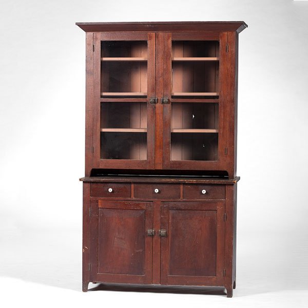 Stepback Cupboard : Stepback Cupboard American, 19th century. A two-piece stepback cupboard, the upper section with projecting cornice and glazed doors, the lower section with three dovetailed drawers over two paneled 
