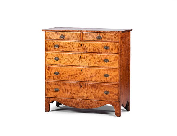 Hepplewhite Curly Maple Chest of Drawers : Hepplewhite Curly Maple Chest of Drawers American, early 19th century. A chest of drawers in curly maple with pine secondary, dovetailed drawers with overlapping fronts, original brasses, a shaped 