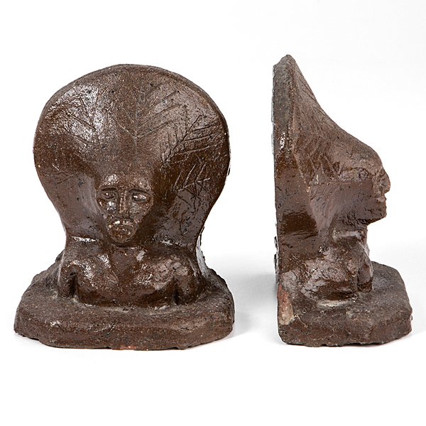 Grand Ledge Sewer Tile Indian Bookends : Grand Ledge Sewer Tile Indian Bookends American (Michigan) late 19th-early 20th century. Produced by the Grand Ledge Sewer Pipe company. A pair of sewer tile glazed bookends (or doorstops) in the 