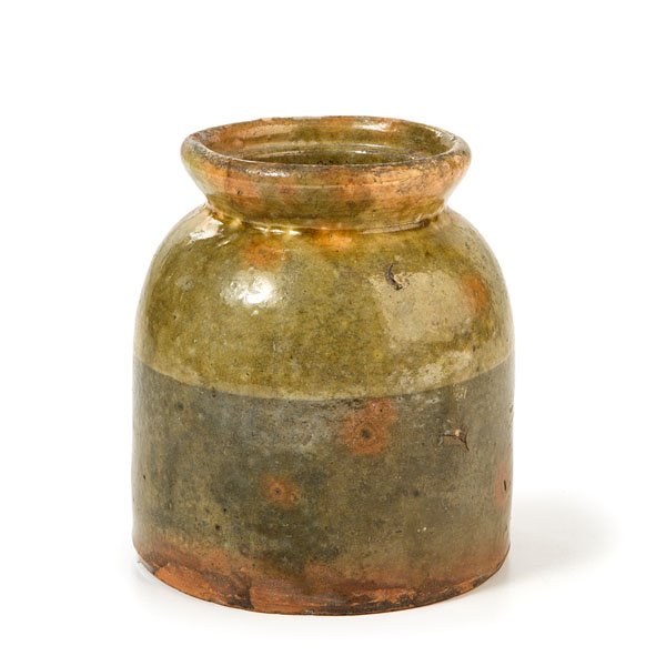 Connecticut Dip Glazed Redware Jar : Connecticut Dip Glazed Redware Jar American (Connecticut), 19th century.A small dip glazed redware jar in earth tones; ht. 6 in. Provenance: From the Estate of Kenneth Erwin, Portland, Michigan