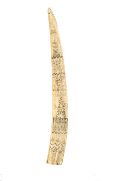 Victorian Scrimshawed Walrus Tusk : Victorian Scrimshawed Walrus Tusk English, mid-19th century. A walrus tusk scrimshawed on one side with a large towered building and elaborate patterns including hearts, rosettes and laurel sprigs; 