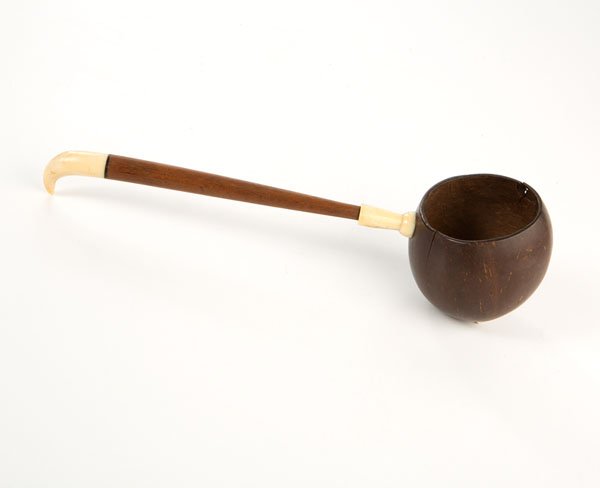 Coconut and Whale Bone Dipper : Coconut and Whale Bone Dipper American, mid-19th century. A whaler's dipper made from a coconut with wooden handle and whale's tooth base and tip; lg. 13.25 in.