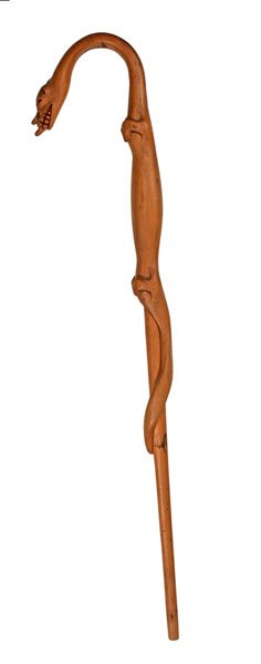 Folk Art Dragon Cane : Folk Art Dragon Cane American, 19th century. A wooden cane with shaft melding into the form of a dragon-type creature with red-painted eyes, exposed teeth and tongue whose neck and head form the ha