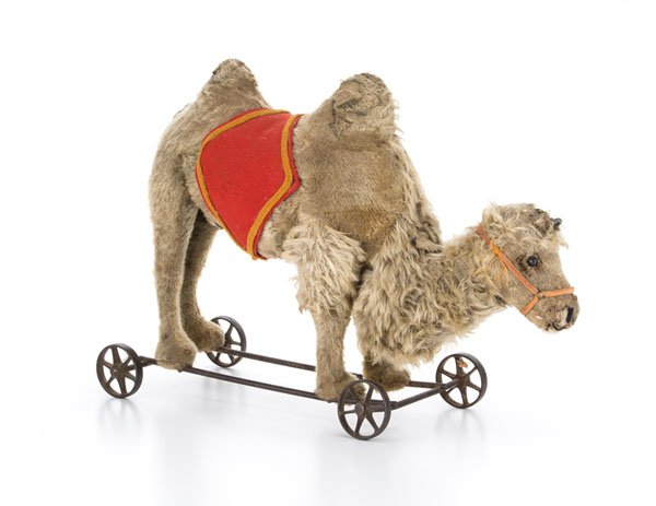 Early German Wheeled Camel Pull Toy : Early German Wheeled Camel Pull Toy German, 19th century. A stuffed camel pull toy; ht. 16 in. Provenance: Property from the Estate of Jane Murphy, Shandon, Ohio