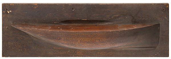 Mounted Half Hull Ship's Model : Mounted Half Hull Ship's Model A painted and stained half hull ship's model, mounted onto a wooden backboard. Retains original finish; 9.75 x 35 in. Provenance: From the Estate of Kenneth Erwin, P