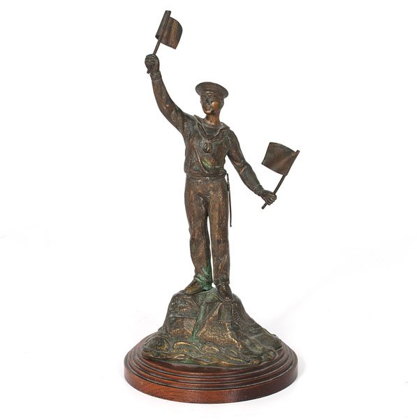Bronze Sailor Sculpture : Bronze Sailor Sculpture American, 20th century. A bronze sailor waving semaphore flags, mounted on a graduated wooden base; ht. 15.5 in. Provenance: From the Estate of Kenneth Erwin, Portland, Mi