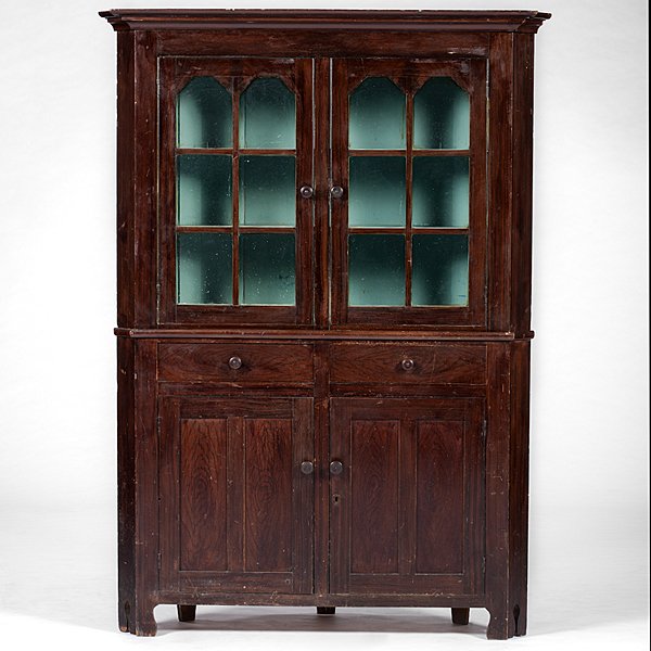 Grain-Painted Two Piece Corner Cupboard : Grain-Painted Two Piece Corner Cupboard Probably Canadian, 19th century. A china corner cupboard in grained paint with molded cornice over two six-light doors over two aligned drawers, then two p