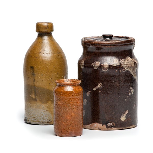 Midwestern Stoneware : Midwestern Stoneware American (Midwest), 19th century. An assembled group of three pieces of glazed Midwestern stoneware, including a bottle, a small jar, and a larger lidded jar; bottle ht. 9 in.�