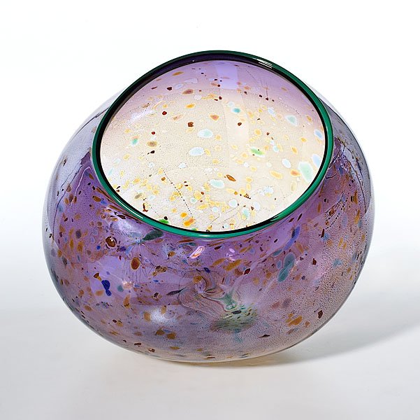 Freeform Basket, by Dale Chihuly : Freeform Basket, by Dale Chihuly Dale Chihuly (American, b. 1941). A freeform glass basket having a turquoise lip with a mottled lavender and yellow interior. Signed and dated 1991; 8 in. width, 7.