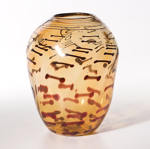 An Early Freeform Vase, by Dale Chihuly : An Early Freeform Vase, by Dale Chihuly Dale Chihuly (American, b. 1941). A freeform vase having an amber interior with swirling ruby accents. Unsigned; 9 in. height. Consignor's immediate family 