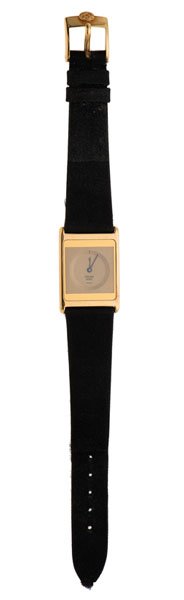 A Concord Delirium Wrist Watch in 18 Karat Yellow Gold : An 18k yellow gold Concord Delirium tank-style wrist watch. Original black silk band with 18k buckle. Case serial number 449093. 1.8mm. thick. With box and original paperwork.