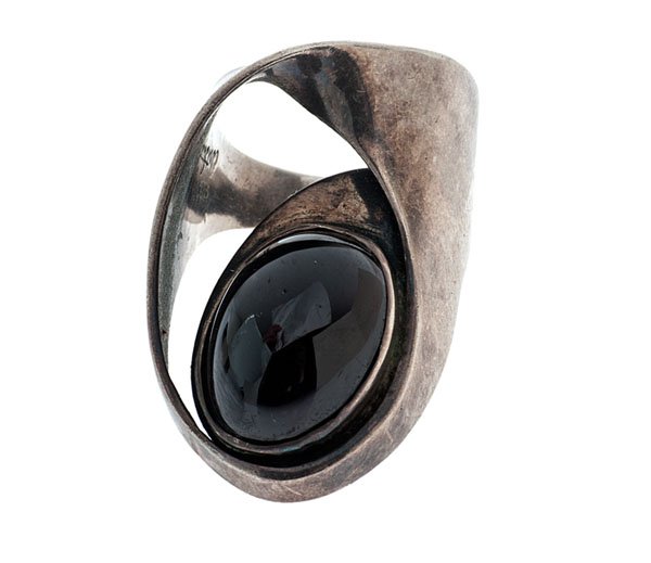 Art Smith Sterling and Garnet Ring : Genuine Art Smith sterling silver free-form ring containing one 16mm x 12mm oval cabochon garnet set in a bezel. Size 7.5 Arthur Smith was born to Jamaican parents in Cuba in 1917. His family settle
