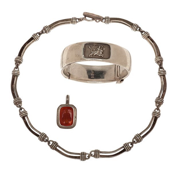 Slane & Slane Sterling Bangle Bracelet, Carnelian "Bee": Slane & Slane 6.5" hinged bangle bracelet in solid sterling silver with an embossed scene depicting a woman riding a lion along with a Slane & Slane 17" toggle necklace featuring 10 cast sterling silv