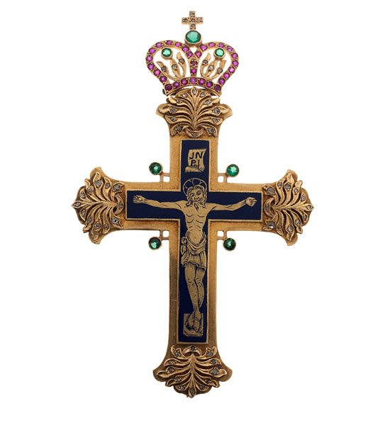 Large Enameled Crucifix with Gemstones : A very ornate 14k yellow gold crucifix containing 29 faceted rubies, 7 tsavorite garnets, and 59 rose cut diamonds weighing approximately .59 carats. Blue enamel center with hinged crown. 26.5 dwt. 3.