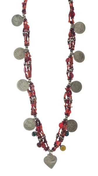 Antique Afghani Silver Coin Necklace : Antique Afghani necklace featuring one heart-shaped and eight round coins and carved carnelian beads.