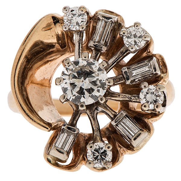 A 14 Karat Yellow Gold Diamond "Spray" Design Ring : A 14k yellow gold ring featuring a VS2- SI1, G-H color center diamond measuring 5.25mm x 5.3mm x 2.85mm and weighing approximately .50 carats accented by four VS2, G color round full cut diamonds weig