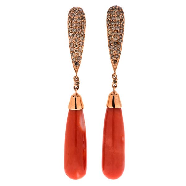 A Pair of 14 Karat Rose Gold Carnelian and Diamond: A pair of 14 karat rose gold carnelian earrings featuring two one inch long, baton-shaped carnelians suspended from a diamond pave section containing 78 I2, L-M color brilliant diamonds weighing 1.11 