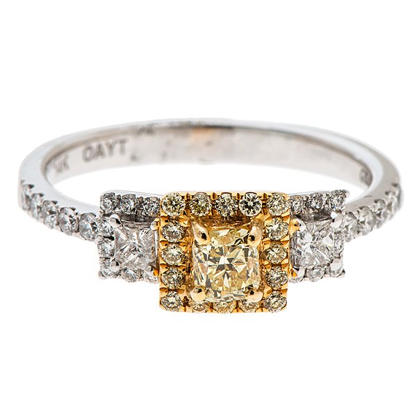 A 14 Karat Fancy Yellow Diamond Ring : A 14 karat two-tone fancy yellow and white diamond ring containing one VS2 fancy yellow square cut center diamond weighing .37 carats accented by 16 VS2 fancy yellow round diamonds weighing .12 carats
