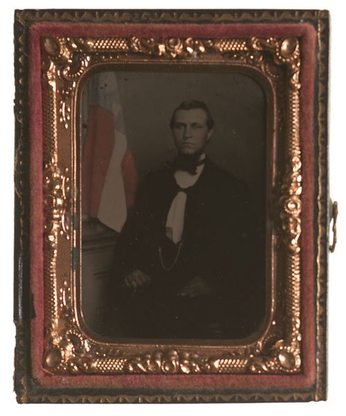 Rare Ninth Plate Ambrotype of a Southerner Posed with: Ninth plate ambrotype of a Southern gentleman seated with the first national flag of the Confederate States of America, tinted red and blue, PLUS a sixth plate daguerreotype of a man and a ninth plate