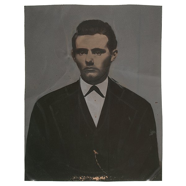 Jesse James, Full Plate, Hand-Colored Tintype, Ca: Full plate, hand-colored tintype of the outlaw Jesse James (1847-1882), accompanied by the full plate, hand-colored tintype of a banjo player, which the James image was found behind in a period wood a
