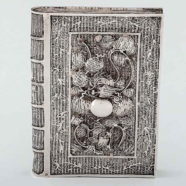 Chinese Export Silver Card Case : Chinese Export Silver Card Case Chinese, late 19th-early 20th century. A silver filigree calling card case in the form of a book with a hinged bottom panel, featuring a front reserve of foliate cann