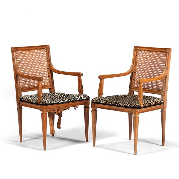 Neoclassical Fruitwood Armchairs : Neoclassical Fruitwood Armchairs Italian, 20th century. A pair of neoclassical carved armchairs in fruitwood, having square, caned backs above gently curved arms with scrolled handholds and upholst