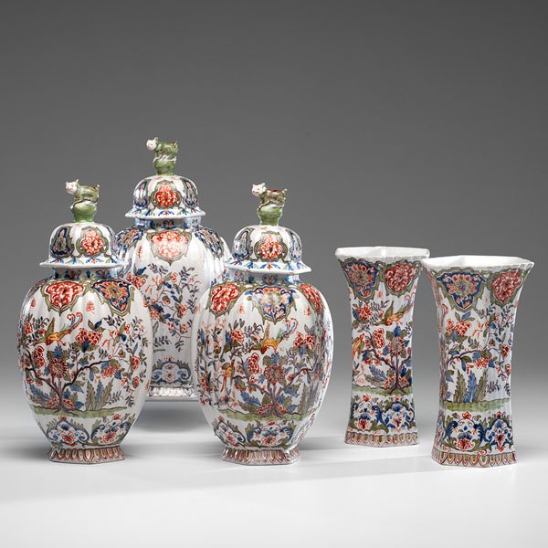 Polychrome Delft Mantle Garniture : Polychrome Delft Mantle Garniture Continental. A five piece mantle garniture of hexagonal form consisting of three covered vases with cat finials and two open vases with flared rims, each piece havi