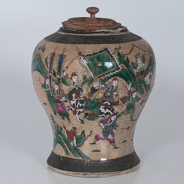 Chinese Cracked Ware Vase : Chinese Cracked Ware Vase Chinese, 19th century. A cracked ware lidded vase adorned with a polychrome war scene. The lid is terracotta, probably a replacement to the original lid; ht. 13.25 in. (wit