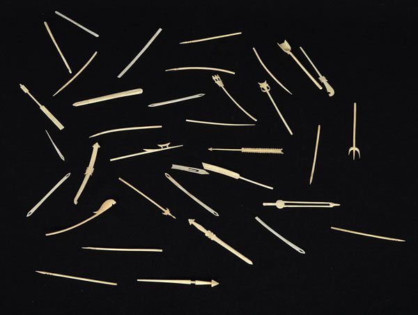 Carved Ivory Picks and Novelties : Carved Ivory Picks and Novelties Continental. An assembled group of thirty-five carved ivory picks and novelty items, including a shovel, an arrow, a sword and other forms; longest lg. 4.75 in.