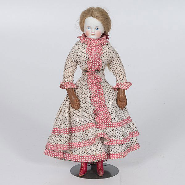 Alt, Beck & Gottschalck Bisque Doll : Alt, Beck & Gottschalck Bisque Doll German, ca 1870s. A bisque shoulder-head doll with cloth body by Philip Goldsmith (Covington, Ky), wearing original wig, print dress and Goldsmith boots; ht. 1
