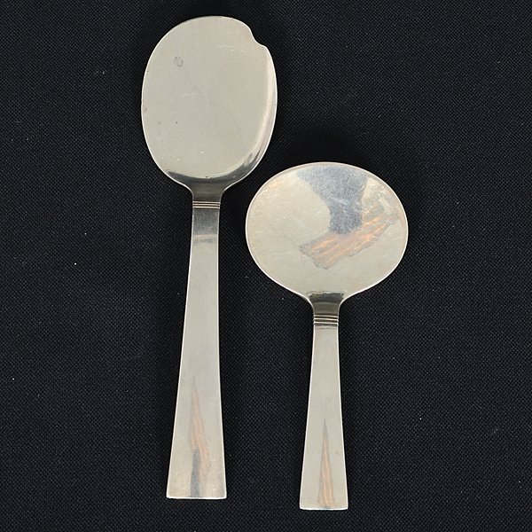 Allan Adler Sunset Sterling Serving Set : Allan Adler Sunset Sterling Serving Set American, 20th century. A 2-piece serving set of Sunset pattern sterling silver spatulas by Allan Adler, each hand hammered and marked Allan Adler Sterling Ha