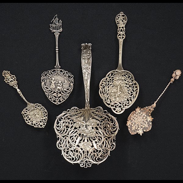Marshall Field and Co. Sterling Spoons, Plus : Marshall Field and Co. Sterling Spoons, Plus American, early 20th century. Two sterling reticulated spoons in the Rococo Revival style, one with Dutch motifs, and one with an orchard scene, both sta