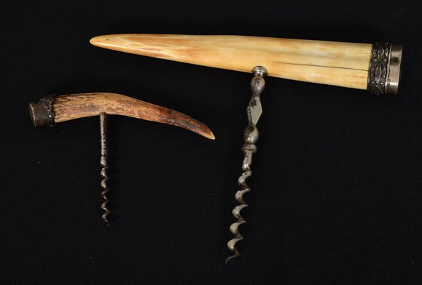 Two Fine 19th Century Corkscrews : Two Fine 19th Century Corkscrews American, 19th century. A corkscrew having a walrus ivory handle and sterling silver cap and a corkscrew with handle made from a deer antler tine, having a sterling 