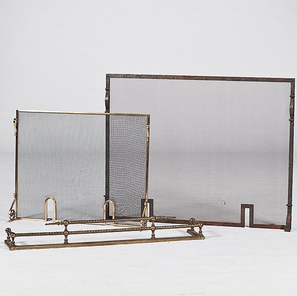 Iron and Brass Fireplace Screens and Fender : Iron and Brass Fireplace Screens and Fender American. An assembled lot of two fireplace screens and a fireplace fender. One screen is Arts and Crafts in wrought iron with riveted ribbon handles and 