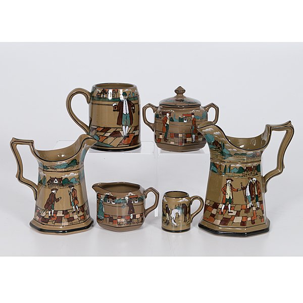 Buffalo Pottery Deldare Ware Items : Buffalo Pottery Deldare Ware Items American, early 20th century. An assembled group of six pieces of Buffalo Pottery Deldare Ware dated 1908, 1909 and 1924, including a creamer and lidded sugar bowl