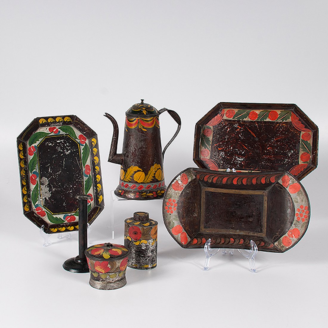 Early Toleware Tablewares, Plus : Early Toleware Tablewares, Plus American, probably Pennsylvania, ca 1835-1840. A group of seven early tolewares to include a lighthouse coffee pot with domed lid and gooseneck spout, a lidded sugar 