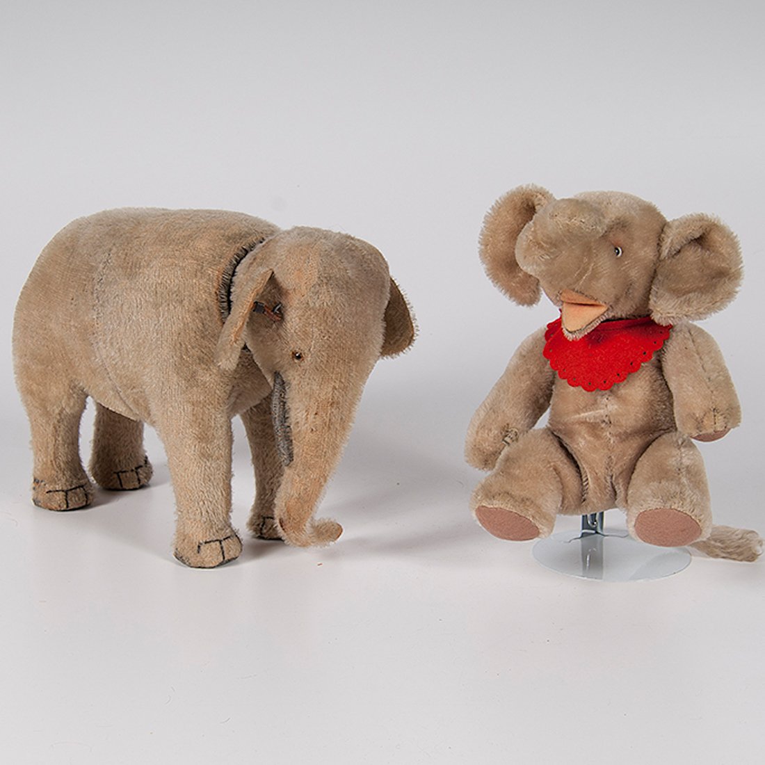 Steiff Jumbo Elephant and Schuco Yes/No Elephant : Steiff Jumbo Elephant and Schuco Yes/No Elephant German, 20th century. Two mohair elephants including, one Steiff elephant, EAN 4322-1 with original yellow tag reading Steiff Original 4322-1 M