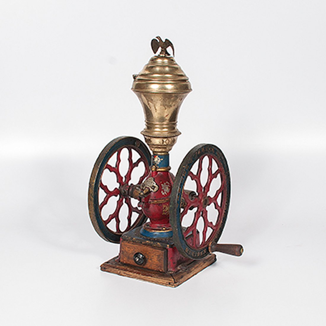 Charles Parker No. 4000 Coffee Grinder : Charles Parker No. 4000 Coffee Grinder American, late 19th century. A large double-wheeled coffee grinder from the Charles Parker Co. Makers, Meriden, Conn., polychrome finish of red, blue and go