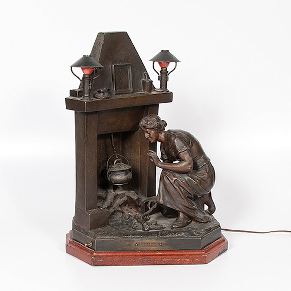 Le Feu Qui Chante Spelter Sculptural Lamp by J[ulien]: Le Feu Qui Chante Spelter Sculptural Lamp by J[ulien] Caussé J[ulien] Caussé (French, 1869-1914). Figural lamp of woman tending to fire, two bulbs on mantle and one in fire that is covered by a re