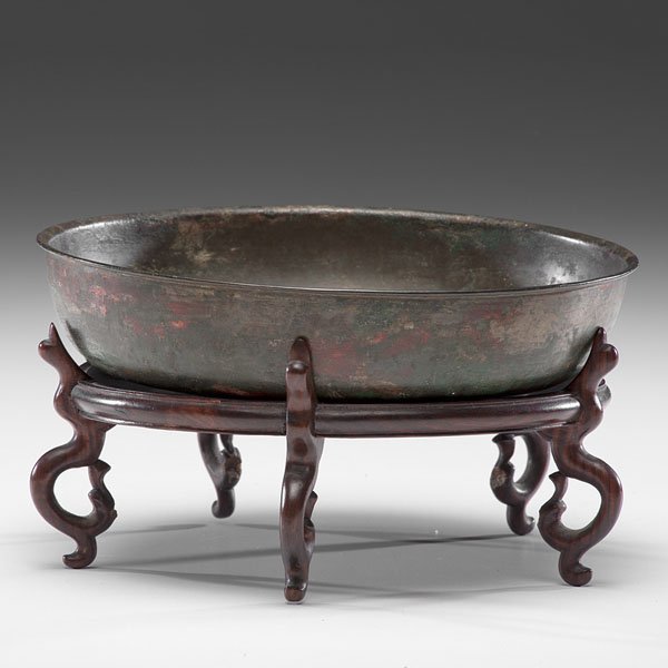 Rare Han Dynasty Bronze Bowl with Inscription and: Rare Han Dynasty Bronze Bowl with Inscription and Fitted Stand Chinese, Han Dynasty. A well and evenly cast shallow bronze bowl, with seven-character inscription to interior, translated to "the fa