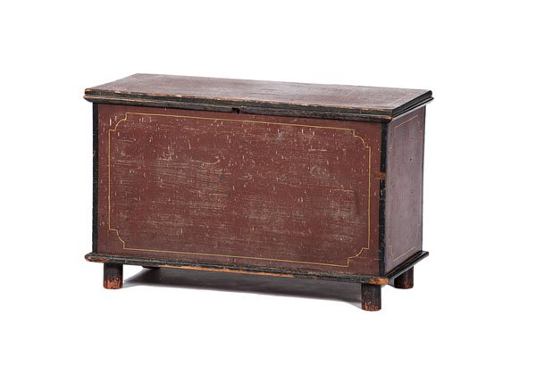 Child's Painted Blanket Chest : Child's Painted Blanket Chest American, 19th century. A small child-sized blanket chest in white pine having brown paint with yellow line decoration, (later) lift top till, and the name "Cora" wri
