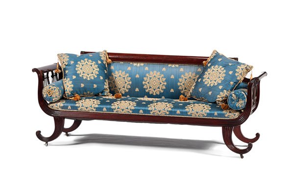 Duncan Phyfe-Style Sofa : Duncan Phyfe-Style Sofa American, 19th century. A mahogany sofa in the style of Duncan Phyfe, upholstered in blue silk with gold bees and medallions, having a shaped and padded back with a conformin