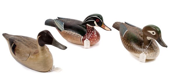Lou Reineri Decoys and a Charles Walker Pintail: Lou Reineri Decoys and a Charles Walker Pintail Reproduction by T.J. Hooker A pair of drake and hen duck decoys by Lou Reineri, marked on bottom Wood Duck Hollow Carved Working Decoy and signed and