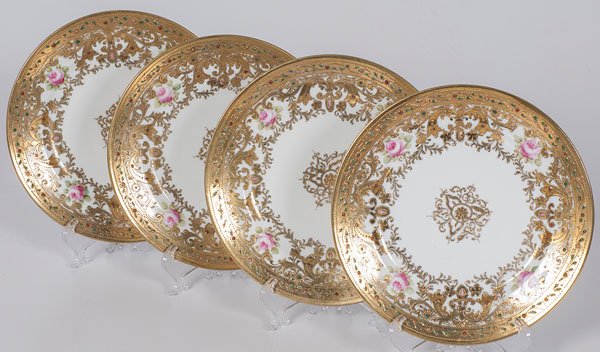 Set of RC Noritake Plates : Set of RC Noritake Plates Japanese, first quarter of 20th century. Four porcelain plates decorated with four flowers along the gilded and beaded edge, and a gilt central pattern with scrolls. RC Nor