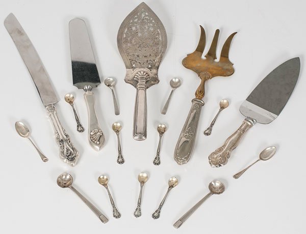 Silver Serving Utensils Plus : Silver Serving Utensils Plus 19th-20th century. An assembled group of serving utensils including an Austrian .812 silver pierced and chased cake server, stamped M&K, a silver gilt serving fork stam