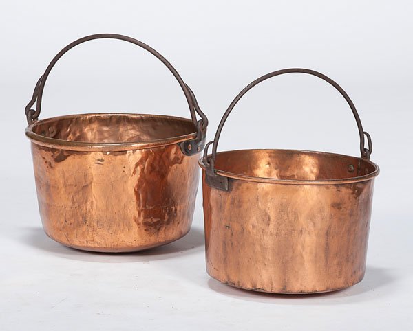 Oversized Copper Buckets : Oversized Copper Buckets Two large copper buckets with wrought iron swing handles and rolled rims; largest ht. 15, dia. 22 in.
