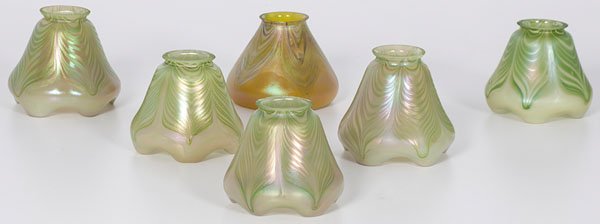 Pulled Feather Glass Shades : Pulled Feather Glass Shades American, 20th century. A group of six iridescent art glass shades, having a crimped form and pulled feather decorations, unmarked; ht. 4.5 in.