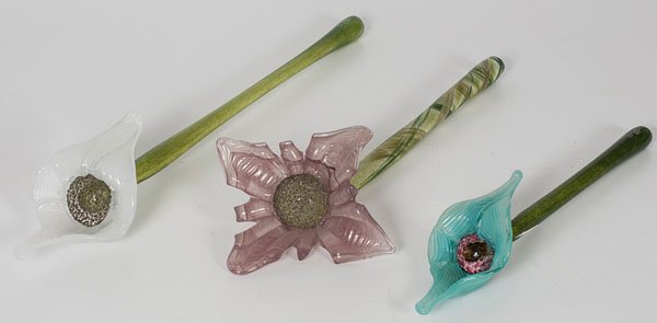 Art Glass Flowers : Art Glass Flowers 20th century. A group of three art glass flowers with single rod stems and fused petals, signed and dated SW '97 and '98; largest lg. 23 in.