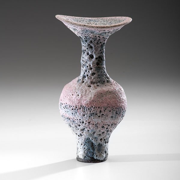 Lucie Rie (1902-1995; Austria/UK) : Lucie Rie (1902-1995; Austria/UK) Flared Rim Bottle ca 1986 Stoneware; ht. 9.5, ht. 5 in. A flared-rim bottle in soft pink and grey crater glaze, this statuesque piece has all the qualities of Rie 