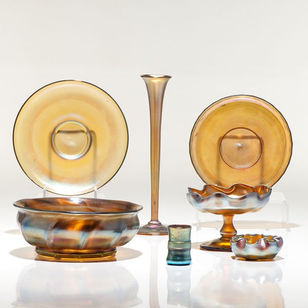 Seven Tiffany Studios Favrile Items : Seven Tiffany Studios Favrile Items American, early 20th century. A group of seven Tiffany Studios favrile articles, including a 5.75 in. dia. dish, a 5.25 in. dia. dish with scalloped sides, a smal